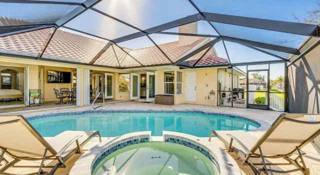Коттедж Luxe Waterfront Oasis w/ Dock, Heated Pool & Spa!