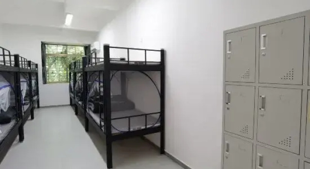 Кровать в общем номере (мужской номер) Wuxiang Gualing Homestay