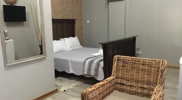 Habitación De ejecutivo African Home Hotel