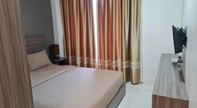 Двухместный номер Deluxe PURNAMA BALIGE HOTEL