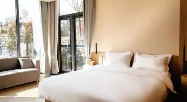 Кровать в общем номере с 6 комнатами Youshan · Huahuading Forest Vacation Apartment