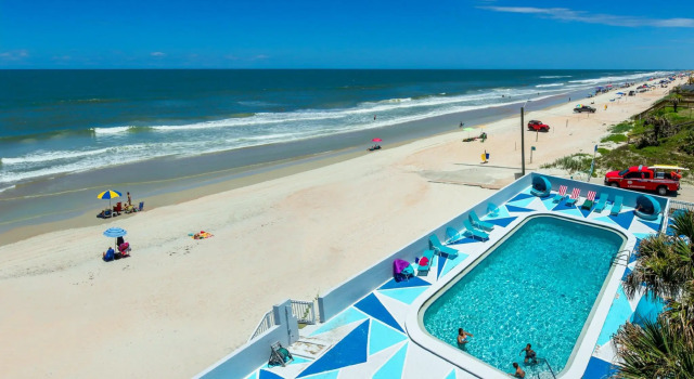 Кровать в общем номере Sea Dip Resort Studios