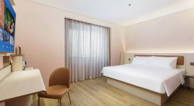 Люкс Deluxe HanTing Hotel (Dalian Development Zone Shuang D Port)