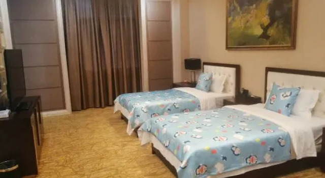 Трёхместный семейный люкс с 2 комнатами West Hot Spring Resort Beichuan