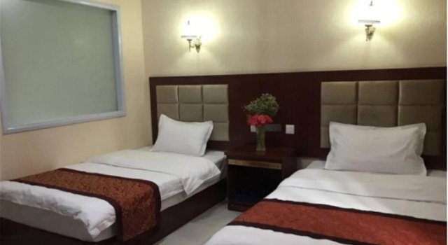 Zhangye Xingang Hotel, Varaa Hotelli Zhangye Gansu