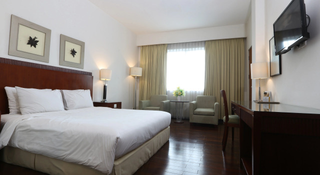 Номер Deluxe Hotel Santika Pontianak