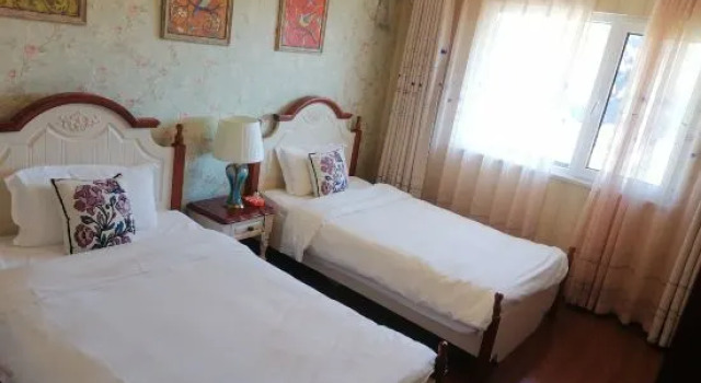 Семейный люкс Дуплекс c 1 комнатой Aiyiyi Leisure Holiday Apartment