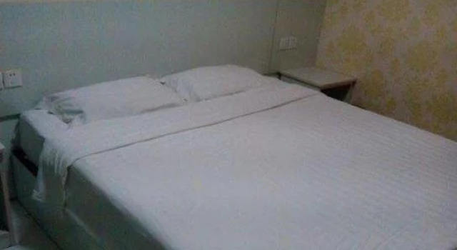 Xinhe Business Hotel, Varaa Hotelli Heze Shandong