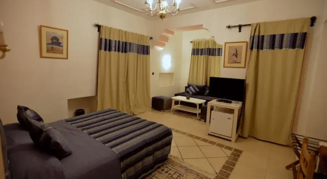 Полулюкс с балконом и с видом на сад Hôtel Le Tinsouline