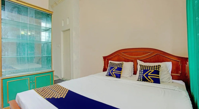 Confort chambre SPOT ON 92905 Sutomo Residence Syariah Near Taman Tugu Padang Area