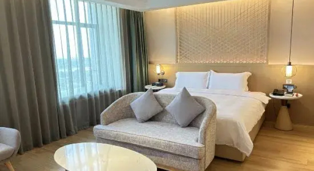 Шестиместный семейный люкс с видом на море True Go Hotel (Garden Expo Park Branch, Zhuzilin Subway Station, Futian District, Shenzhen)