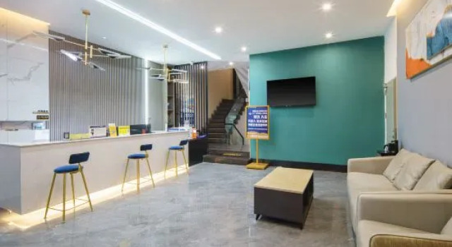 Xinhui Light Culture Hotel (Baoshan Kowloon Store), Buchen Sie Hotel Baoshan Yunnan