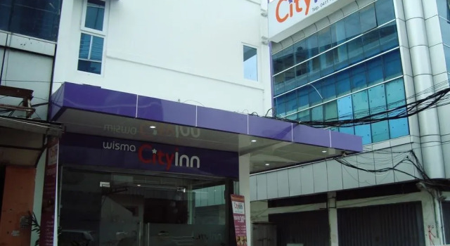 Wisma City Inn, Prenota Hotel Hotel a Sulawesi con parcheggio, Parcheggio