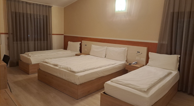 Четырёхместный номер Economy Hotel Dogana