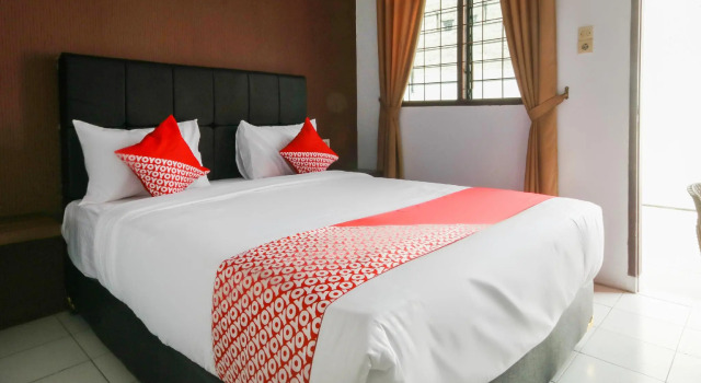 Hotel O Papakoel Guest House, Rezerwuj Pensjonat Medan Sumatra