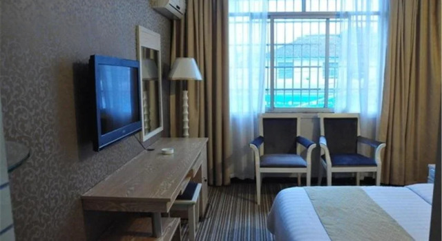 Zhangjiajie Huaya Business Hotel, Забронировать Отель Йонг Дин 