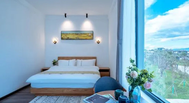 Dali Qixi Homestay, Prenota Hotel Dali Yunnan