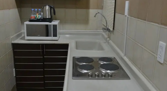 Апартаменты The First Tower Hotel Apartment