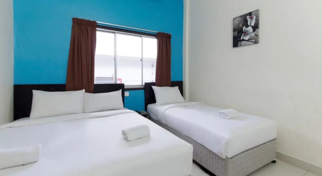Трёхместный номер Standard Hotel Grand Mutiara