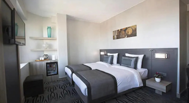 Номер Standard Akoni Hotel