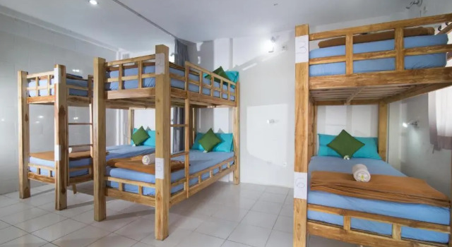 Кровать в общем номере Grand Sea View Lembongan