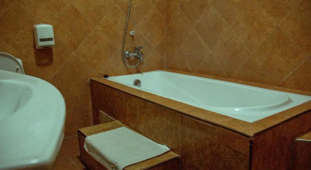 Номер Deluxe New Charity Hotel International