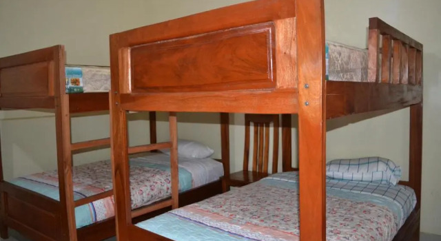 Кровать в общем номере Keva Guest House