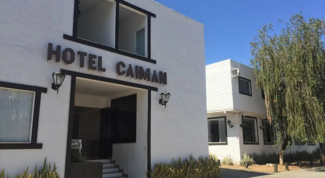 Hotel Caiman, Забронировать Отель Дивинополис Минас-Жерайс
