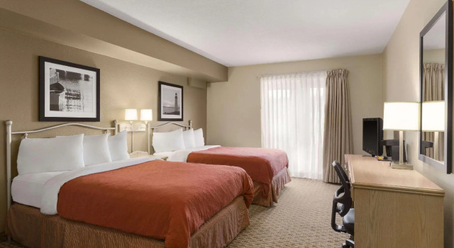 Четырёхместный номер Standard Travelodge Suites by Wyndham Saint John