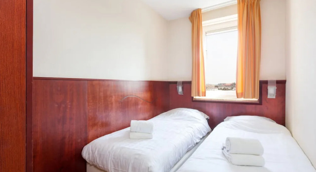 Cozy Apartment Directly on the Boulevard of Egmond aan Zee, Забронировать Апартаменты/квартира Апартаменты Эгмонд-ан-Зе, Апартаменты/квартира