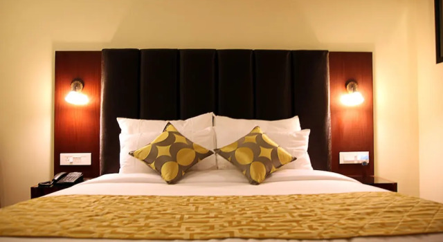 Номер Deluxe Hotel Cama