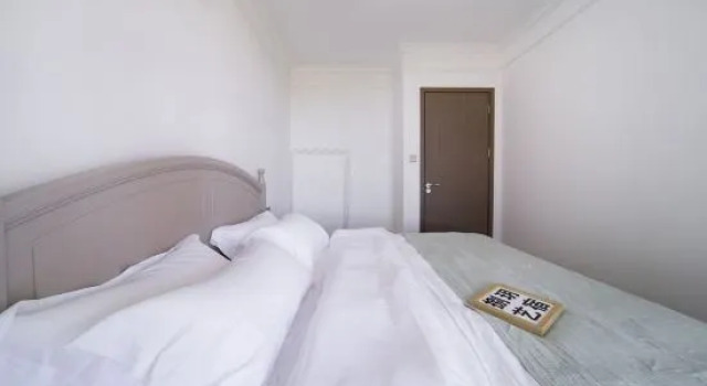 Семейный люкс с красивым видом из окна Nanhai Mingzhu Sea View Resort Homestay