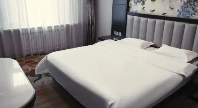 Люкс Deluxe He Qi Boutique Hotel