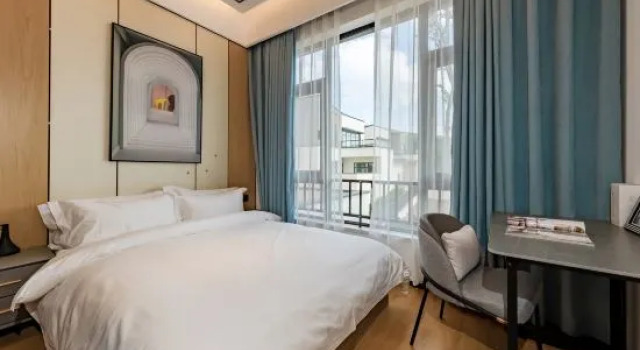 Люкс Fuxian Lake Shisanyue Homestay