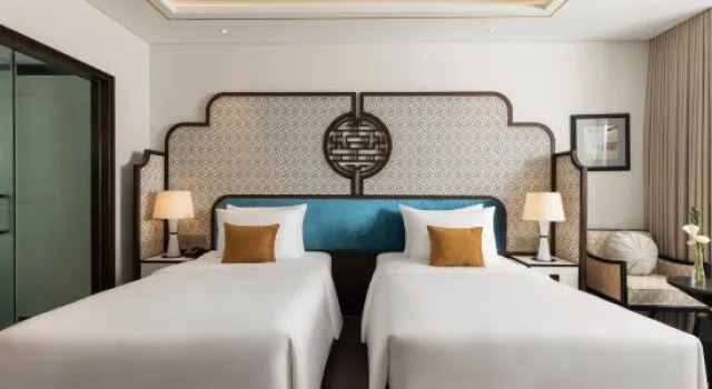 Номер Deluxe с 2 комнатами с балконом Grand Royal Riverside Hue, Fusion Collection
