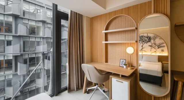 Doppel Studio mit Balkon Model J Hotel BSD Carstensz