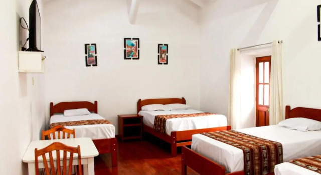 Habitación triple Estándar con balcón Intiraymi Guest House
