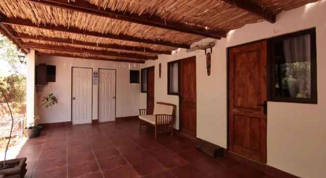 Кровать в общем номере Portal Andino Lodge