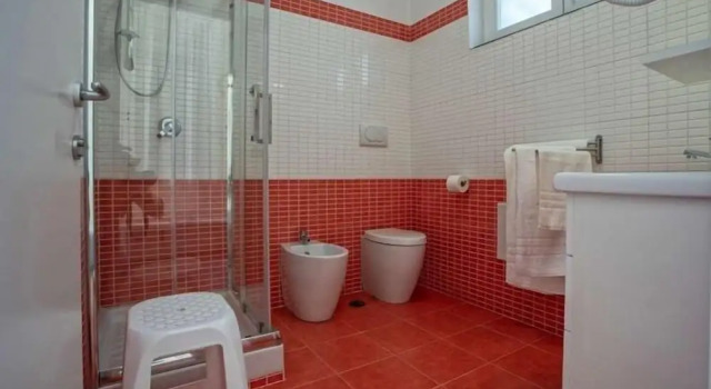 Четырёхместный номер Standard с видом на сад B&B Carmelina