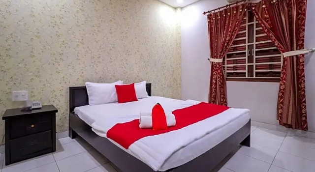 Номер Superior RedDoorz @ Phan Huy Ich Street