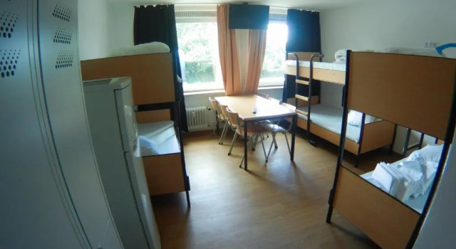 Кровать в общем номере Hostel & Monteurzimmer bei Hansezimmer