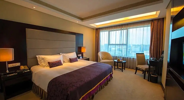 Люкс Executive Yiwu Yimei Plaza Hotel