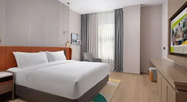 Люкс Deluxe Home2 Suite by Hilton Nantong Vientiane City