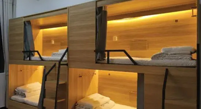 Кровать в общем номере (женский номер) Mangshi Youwang Hostel