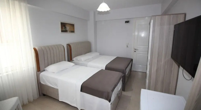 Luxusní Třílůžkový pokoj s balkonem Pegasus Motel