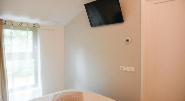In de bocht, Rezervasyon Otel  