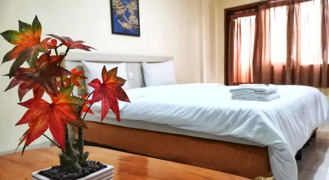 Номер Deluxe Hotel Nusantara Indah Syariah