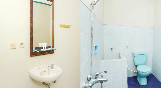 Трёхместный люкс Hotel O Penginapan Kepurun Pawana Indonesia
