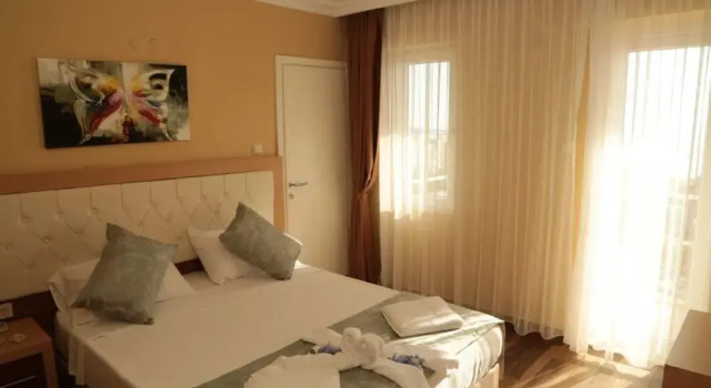 Hotel Room with Shared Pool near Beach in Kusadasi, Забронировать Отель Анталья провинция Анталья