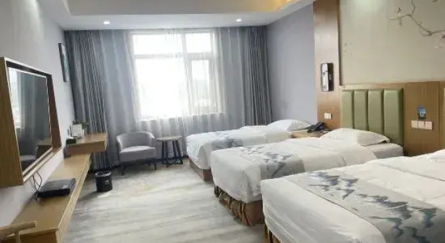 Кровать в общем номере Beijing Junshi Hotel (Fangshan Doudian Town Government)